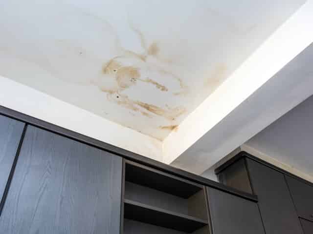 discolored ceiling caused by water leak in mason city